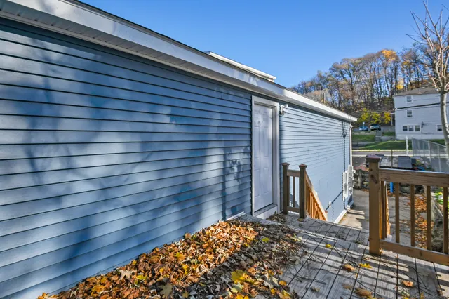a view of a backyard of the house