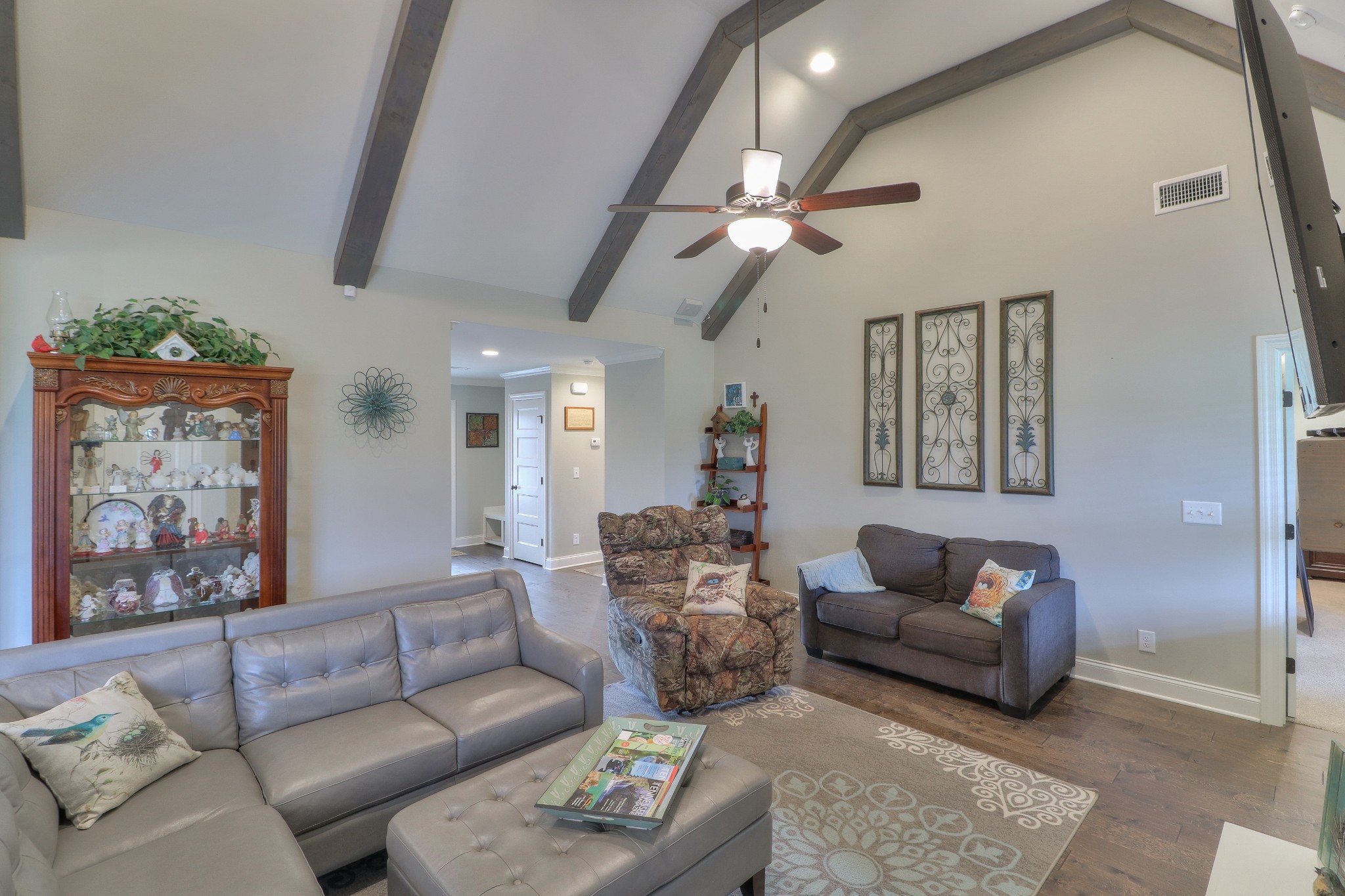 1555 Walnut Hill Road Lebanon, TN 37090 - Photo 14 of 46 a living room with furniture a ceiling fan and a rug