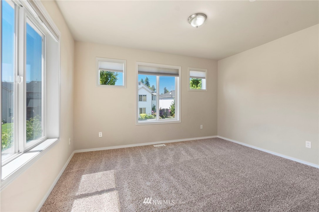 3129 Walker Road DuPont, WA 98327 - Photo 18 of 33 a view of an empty room with a window