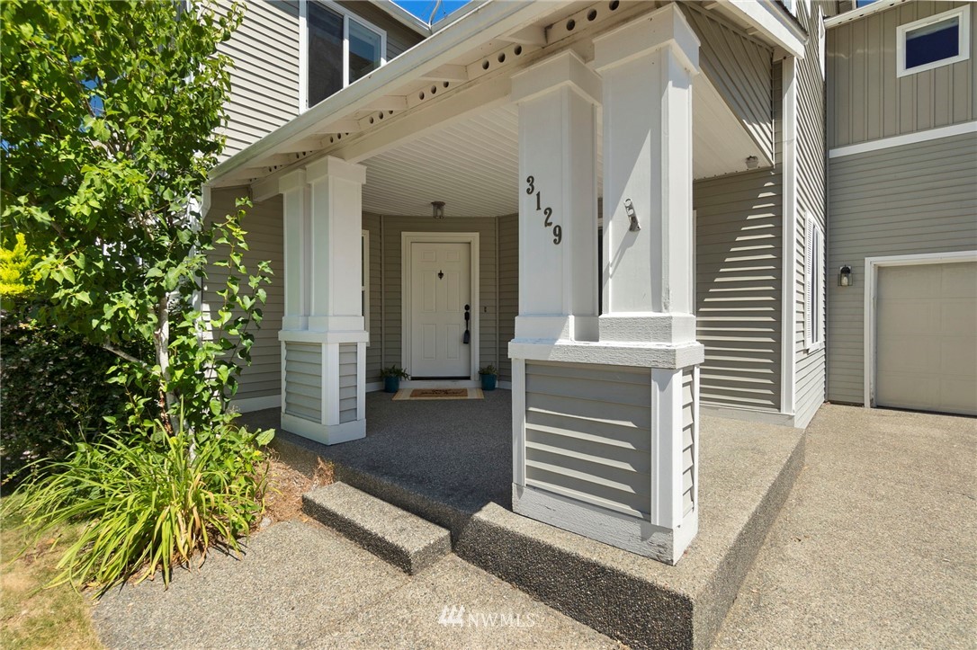 3129 Walker Road DuPont, WA 98327 - Photo 3 of 33 a porch with seating space