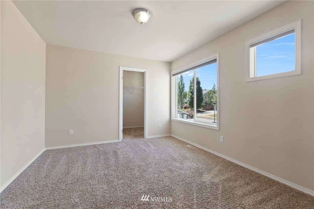 3129 Walker Road DuPont, WA 98327 - Photo 22 of 33 a view of an empty room with a window