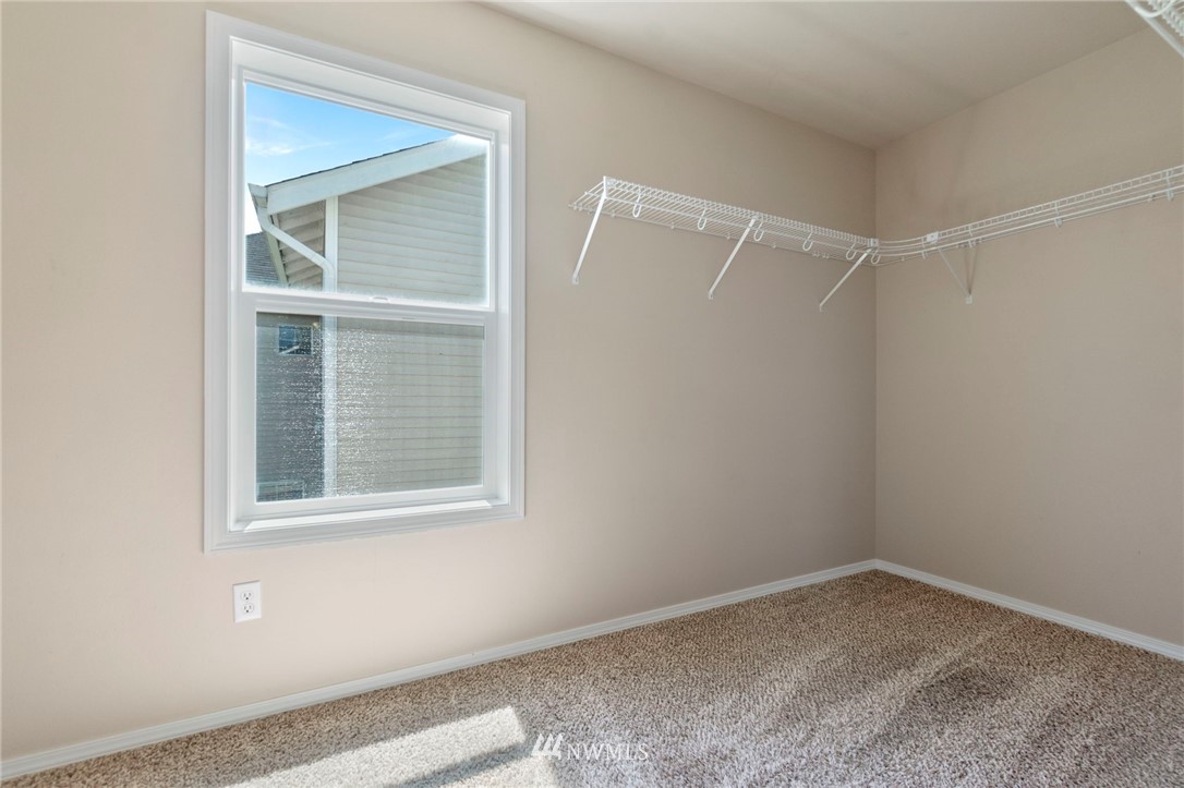 3129 Walker Road DuPont, WA 98327 - Photo 27 of 33 a room that has a window in it
