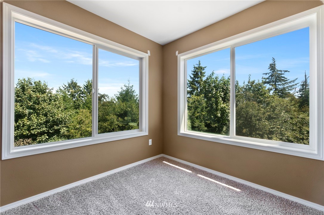 3129 Walker Road DuPont, WA 98327 - Photo 30 of 33 a view of an empty room with a window