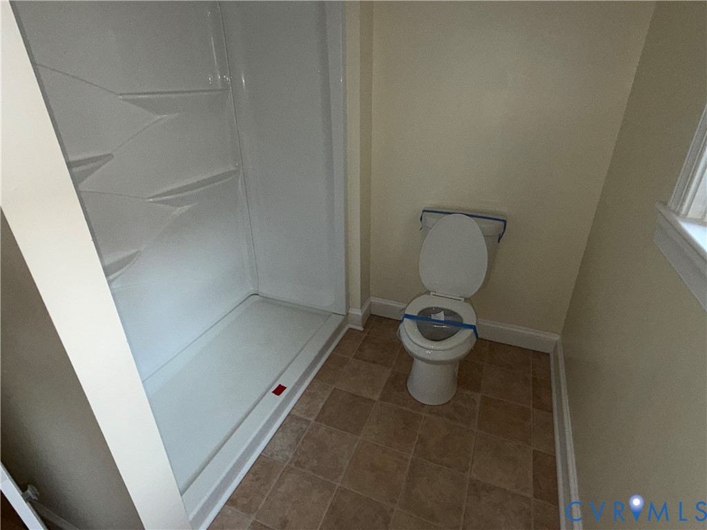113 West Main Street Wakefield, VA 23888 - Photo 11 of 19 a bathroom with a toilet