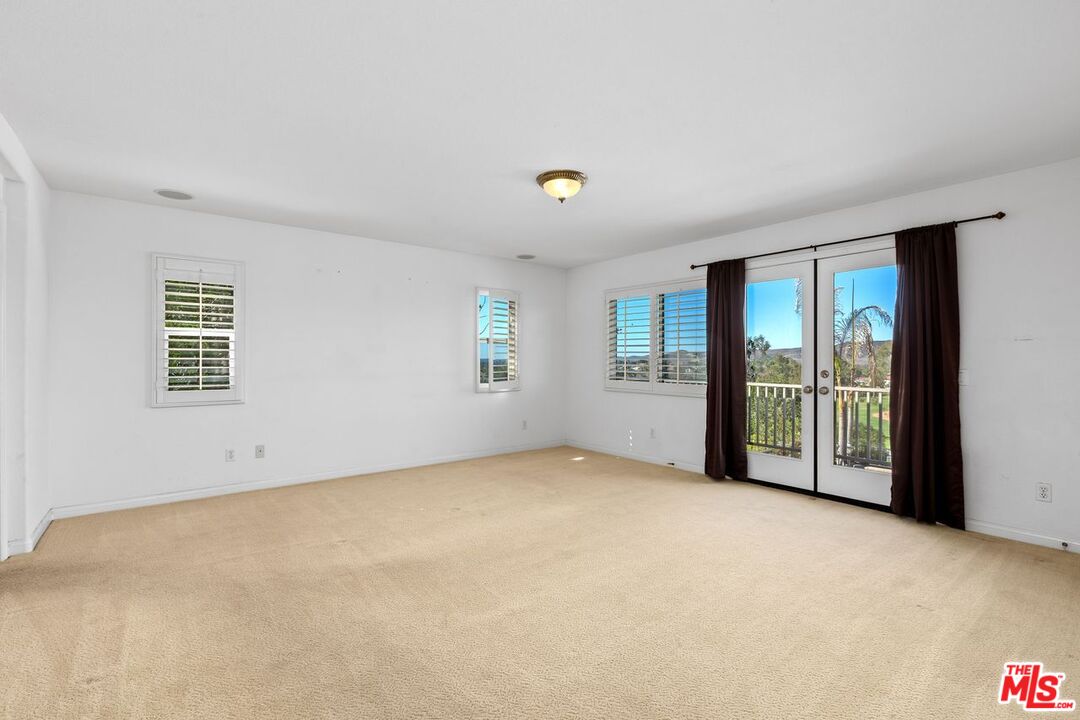1061 Boulder Place Oceanside, CA 92057 - Photo 12 of 19 an empty room with windows