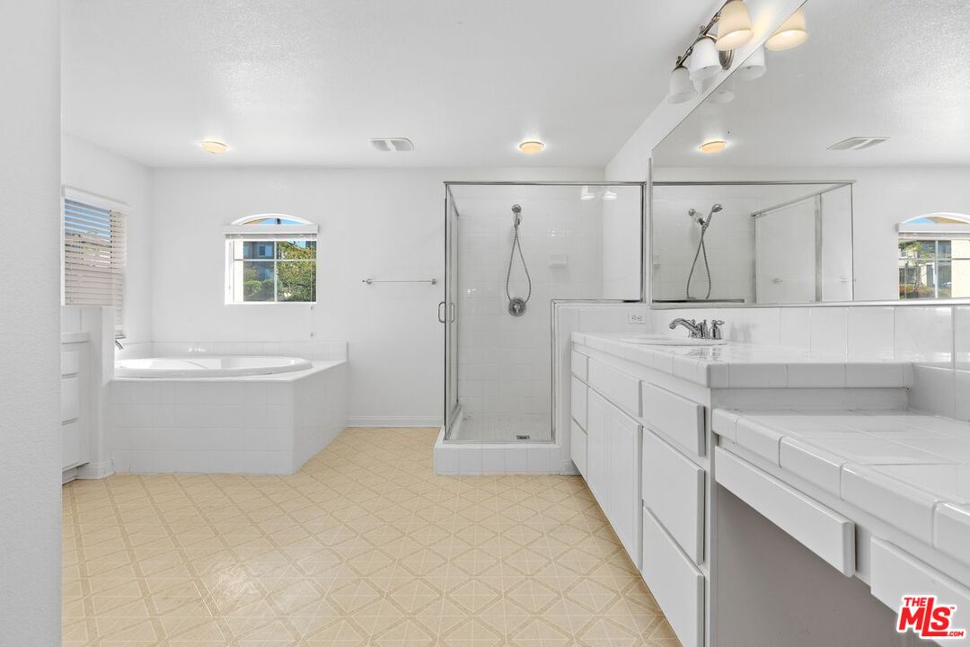 1061 Boulder Place Oceanside, CA 92057 - Photo 14 of 19 a view of a kitchen with white cabinets