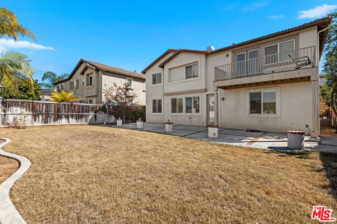 1061 Boulder Place Oceanside, CA 92057 - Photo 19 of 19 a view of a house with backyard and sitting area