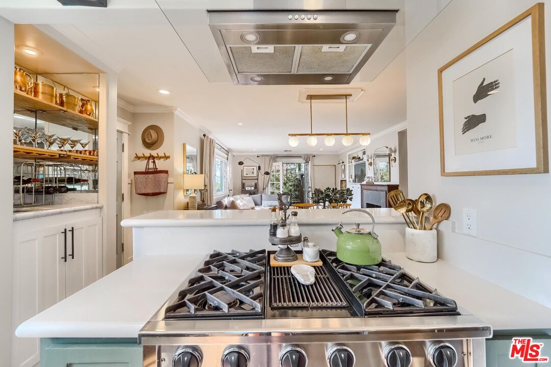 920 Highline Road Glendale, CA 91205 - Photo 13 of 49 a kitchen with a stove and cabinets