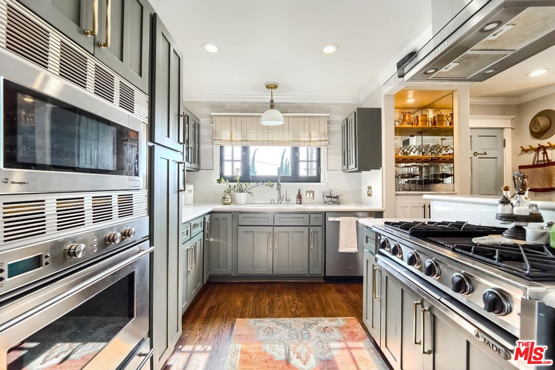 920 Highline Road Glendale, CA 91205 - Photo 14 of 49 a kitchen with a stove and a sink