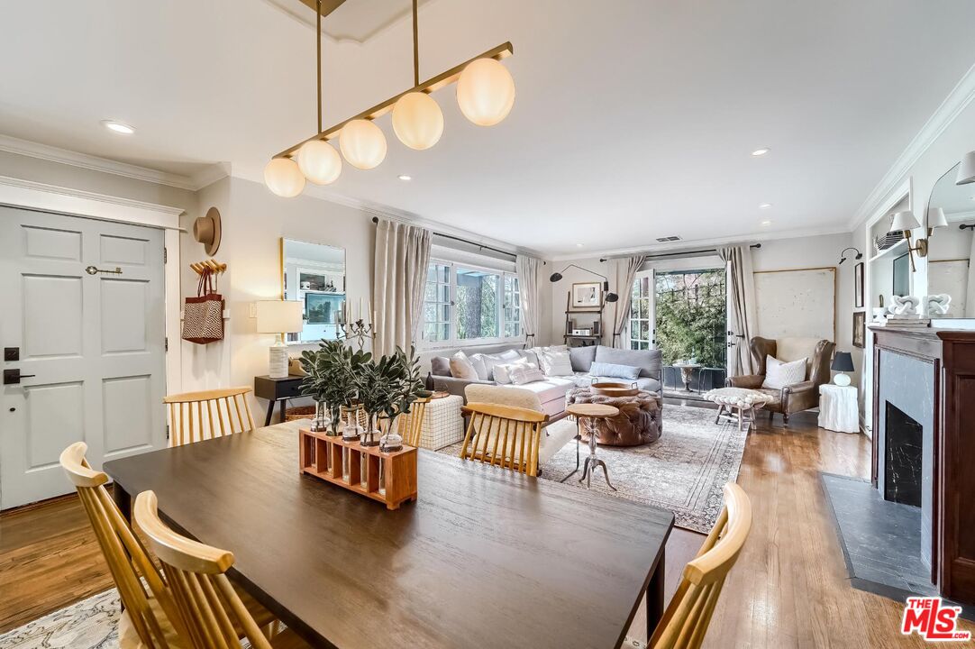 920 Highline Road Glendale, CA 91205 - Photo 19 of 49 a living room with furniture potted plant and a large window