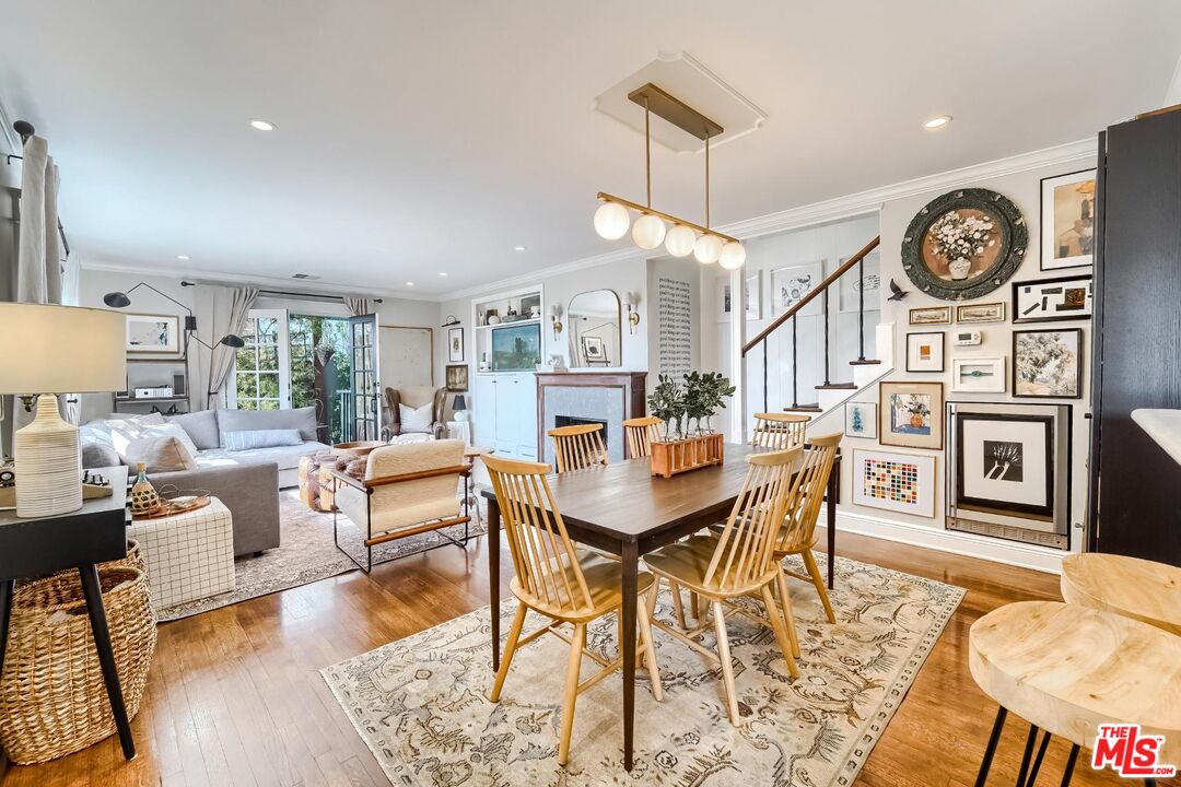 920 Highline Road Glendale, CA 91205 - Photo 21 of 49 a view of a dining room with furniture window and wooden floor
