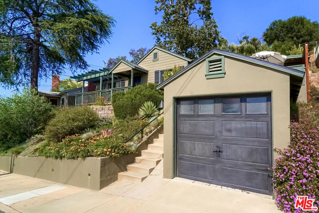 920 Highline Road Glendale, CA 91205 - Photo 3 of 49 a front view of a house with a yard