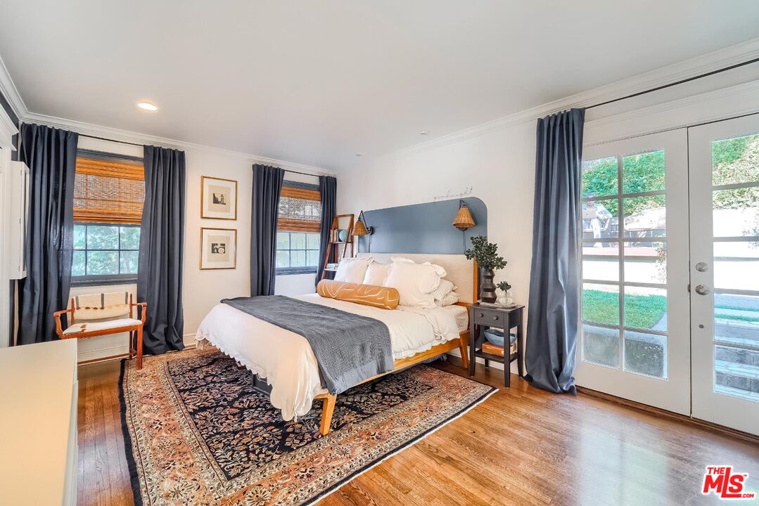 920 Highline Road Glendale, CA 91205 - Photo 32 of 49 a bed room with a bed and a large window