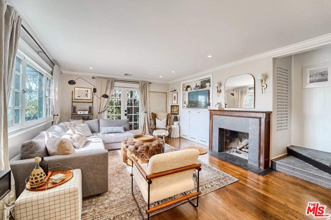 920 Highline Road Glendale, CA 91205 - Photo 9 of 49 a living room with furniture and a fireplace