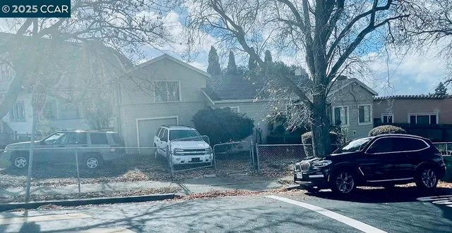 a car parked in front of a house