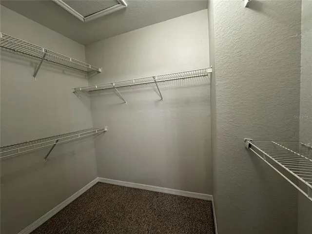 a view of a room with racks on the wall