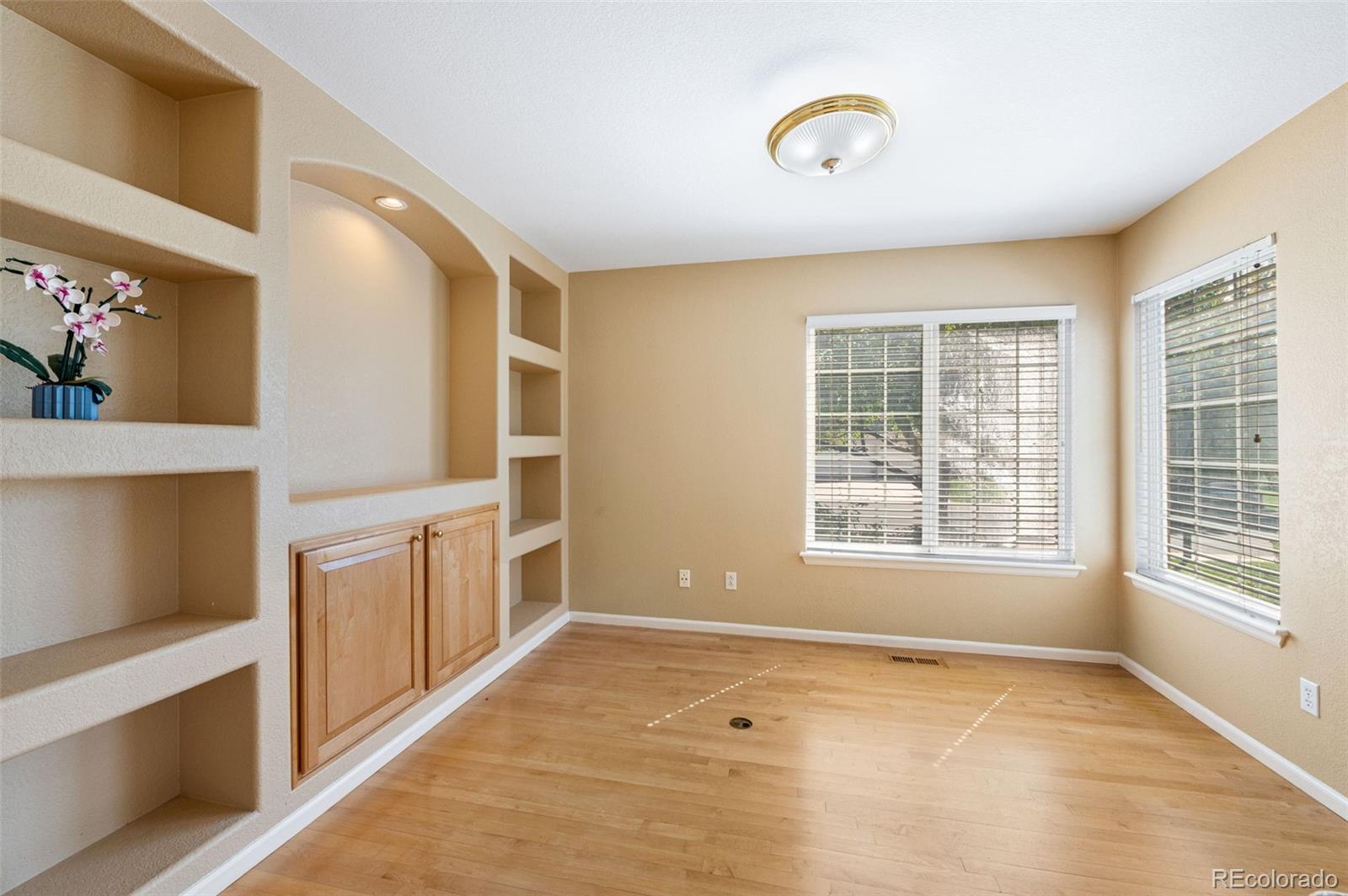 9157 Fox Fire Drive Highlands Ranch, CO 80129 - Photo 23 of 41 a view of an empty room with a window