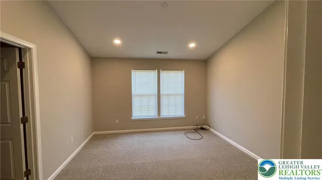 a view of a livingroom with a staircase