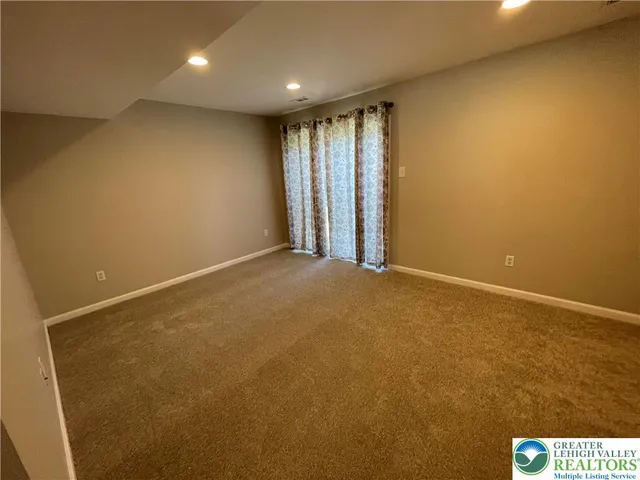 an empty room with window