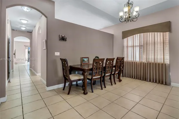 a view of a dining room with furniture