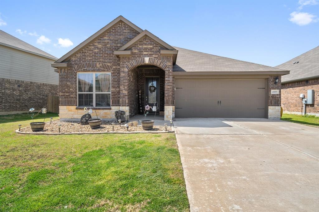 4809 Merchant Trail Denton, TX 76207 - Photo 1 of 1 a view of a house with swimming pool and a porch