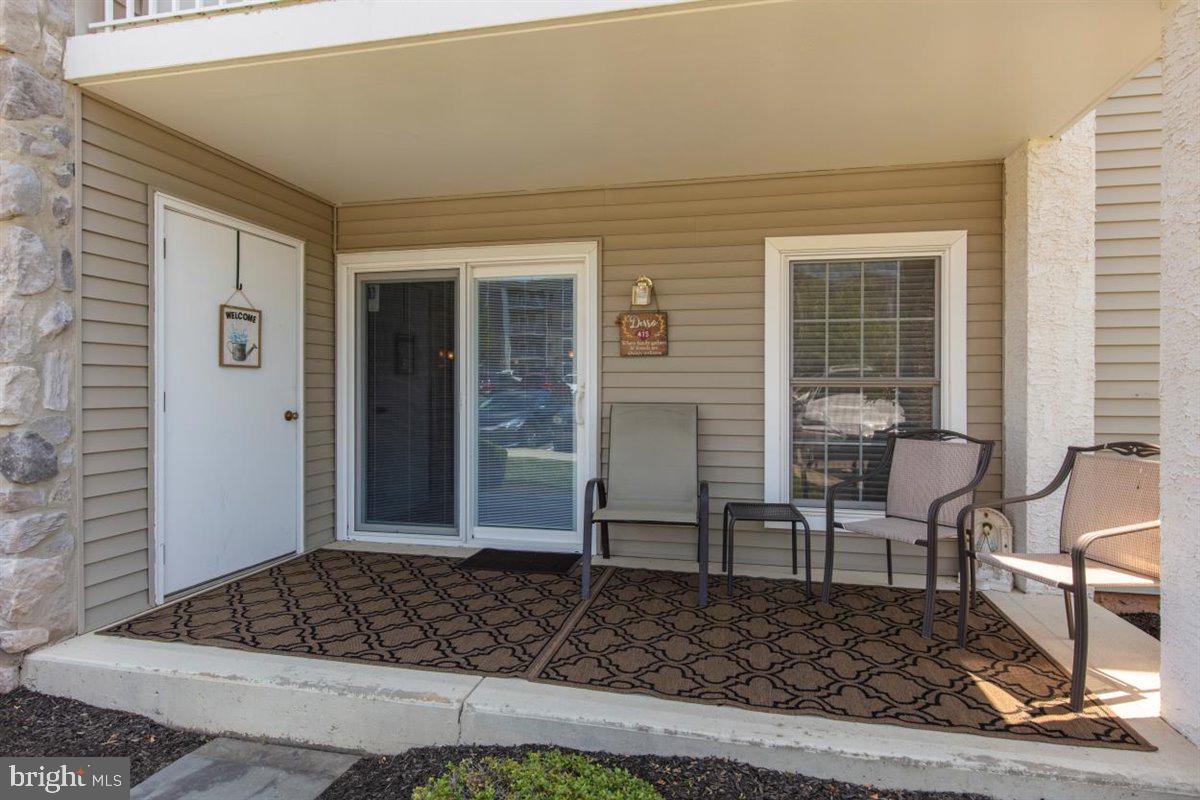 415 Brandon Road, Unit 415 Eagleville, PA 19403 - Photo 3 of 35 Slider to entrance of unit on Level 1