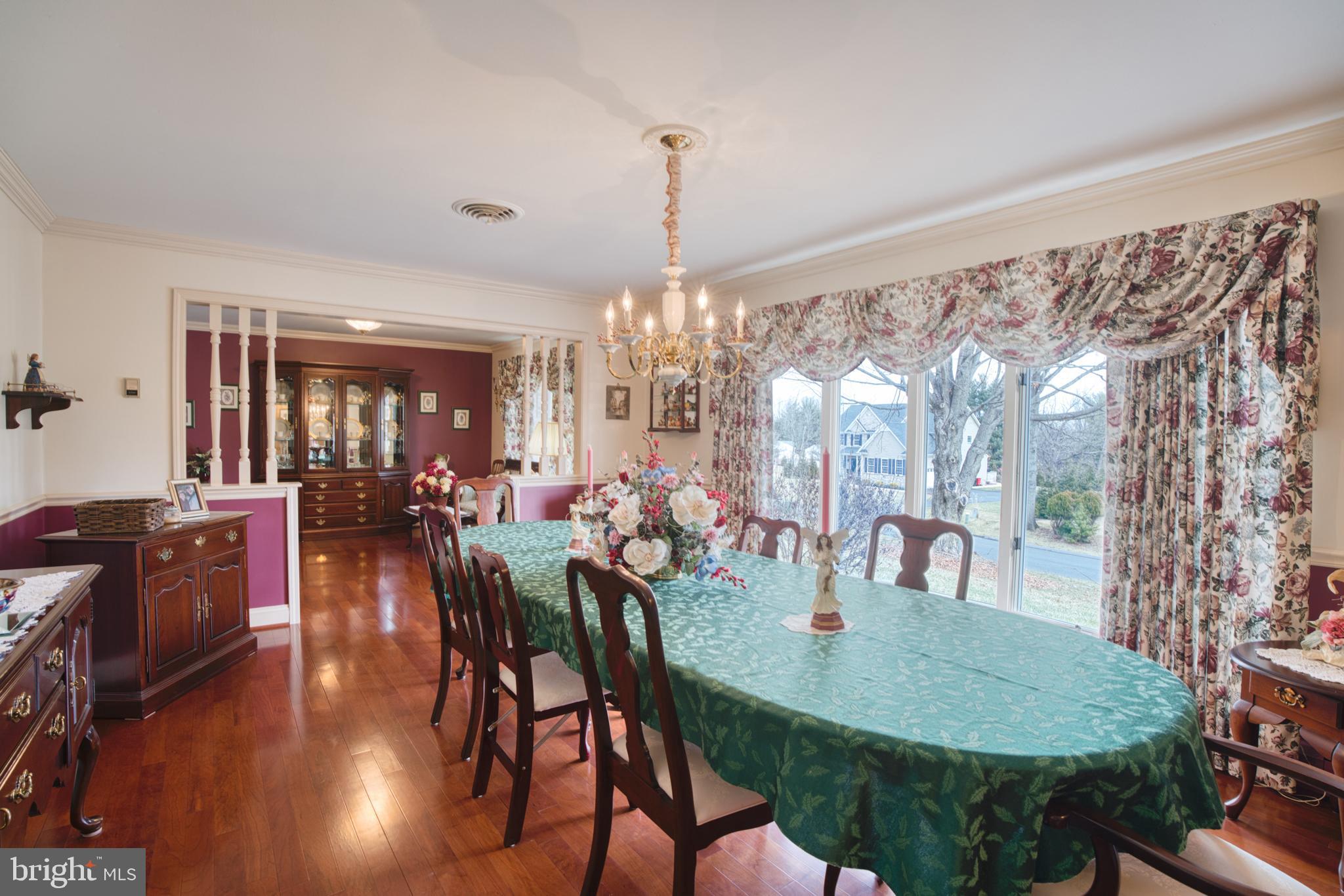 2026 Fallsgrove Way Fallston, MD 21047 - Photo 12 of 62 a view of a dining room with furniture window and wooden floor