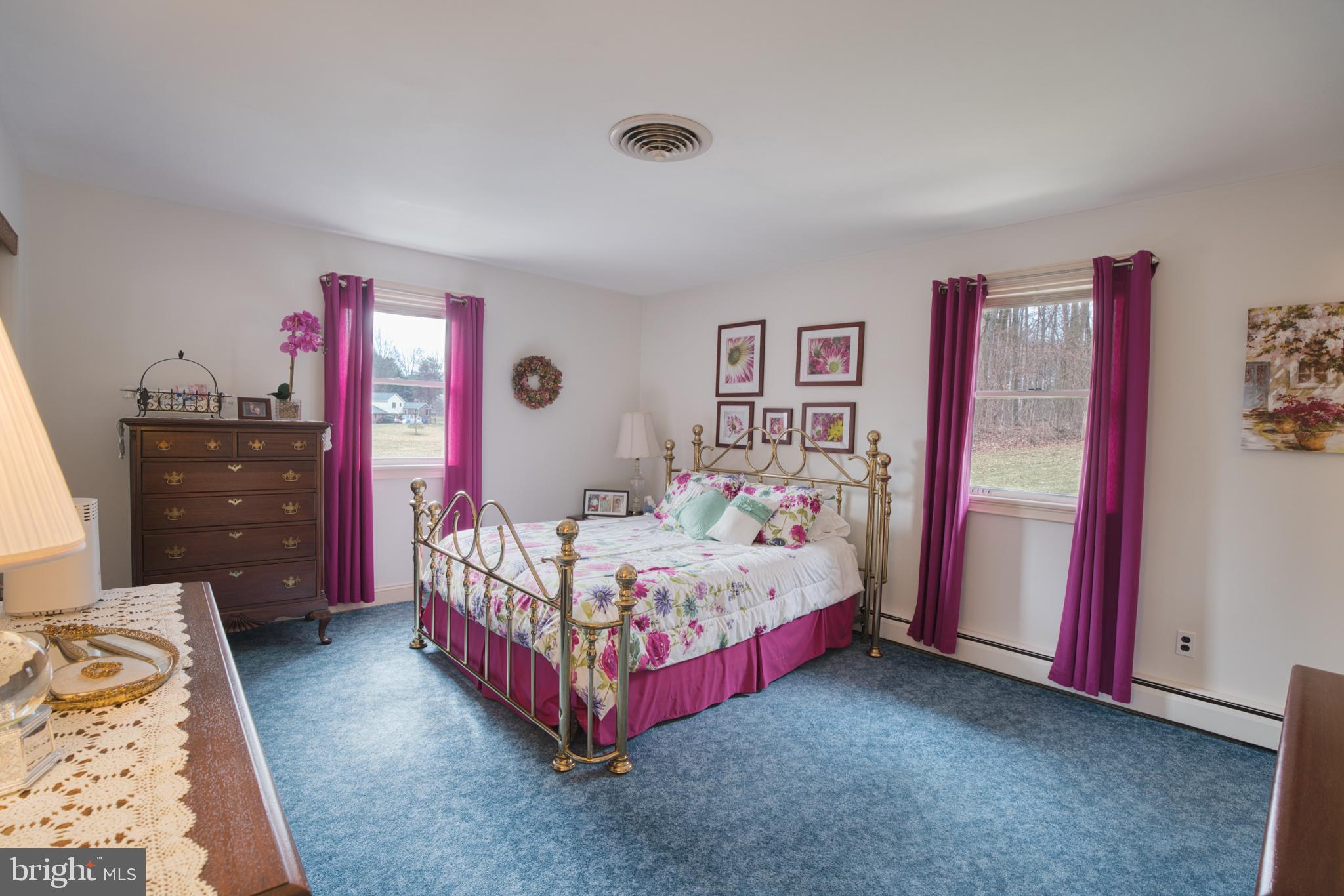 2026 Fallsgrove Way Fallston, MD 21047 - Photo 45 of 62 a bedroom with a bed and a dresser