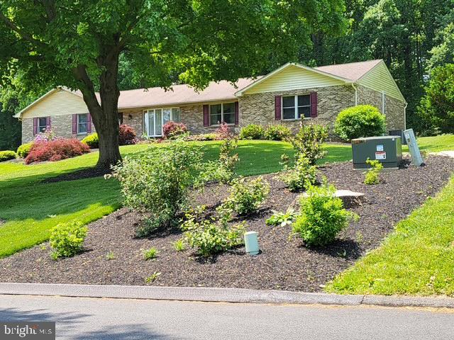 2026 Fallsgrove Way Fallston, MD 21047 - Photo 8 of 62 a front view of a house with a yard and potted plants