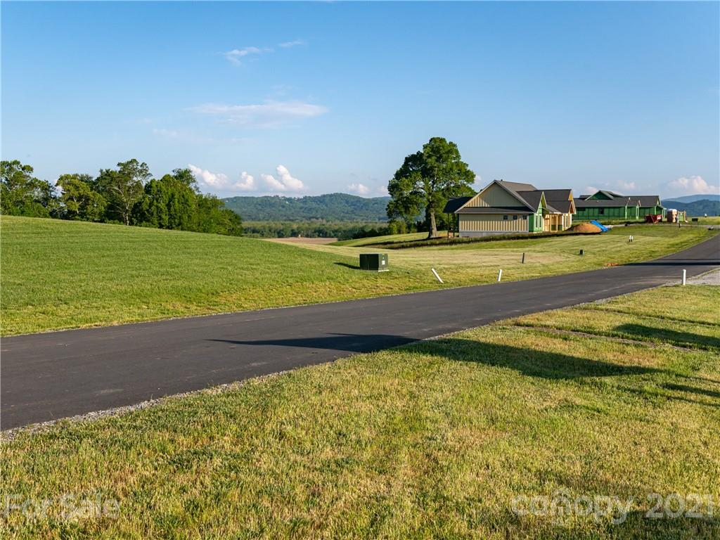 16 Pisgah Ridge Trail Arden, NC 28704 - Photo 4 of 14 a view of a swimming pool with an ocean view