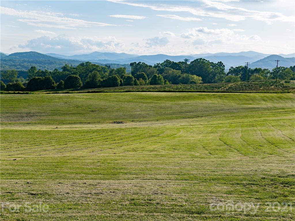 16 Pisgah Ridge Trail Arden, NC 28704 - Photo 5 of 14 a view of a ocean with mountains in the background