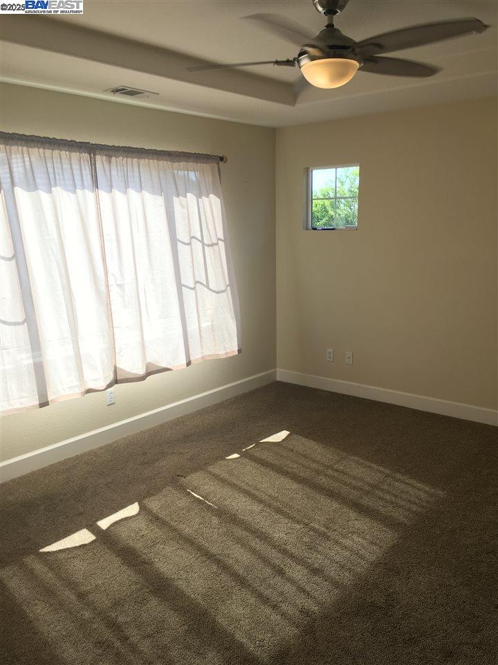 2846 Mint Common Livermore, CA 94551 - Photo 7 of 17 a view of an empty room with a window