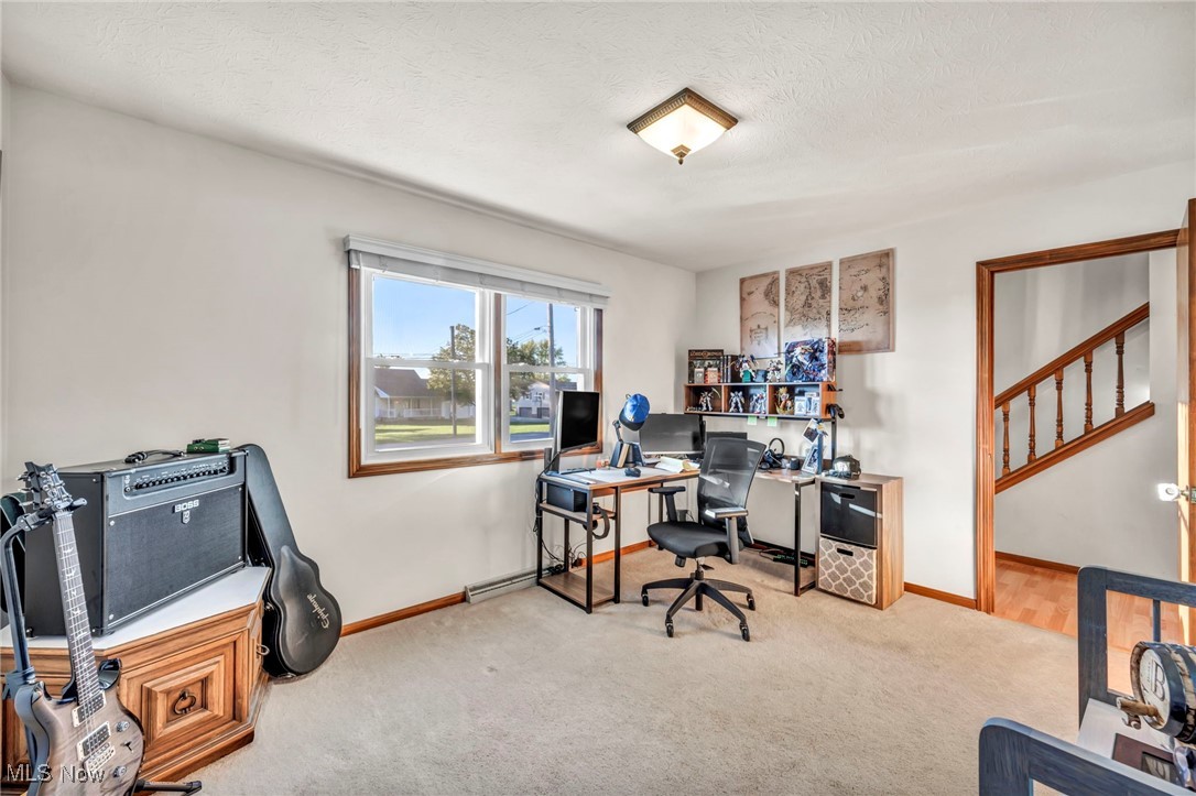 300 Decourcey Rittman, OH 44270 - Photo 23 of 48 1st Floor bedroom loads of natural light