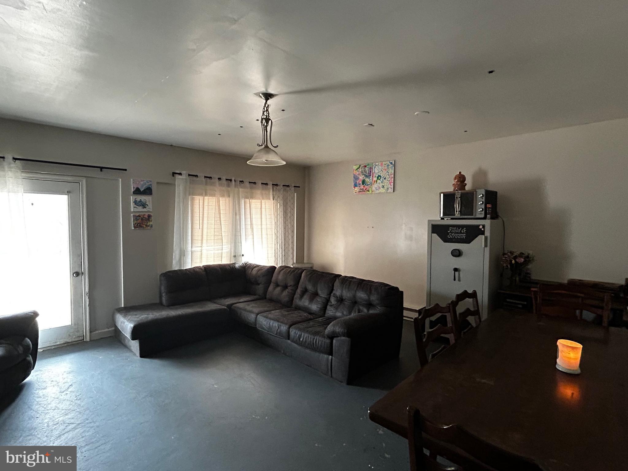 436 Hinsons Ford Road Amissville, VA 20106 - Photo 51 of 54 a living room with furniture and a flat screen tv