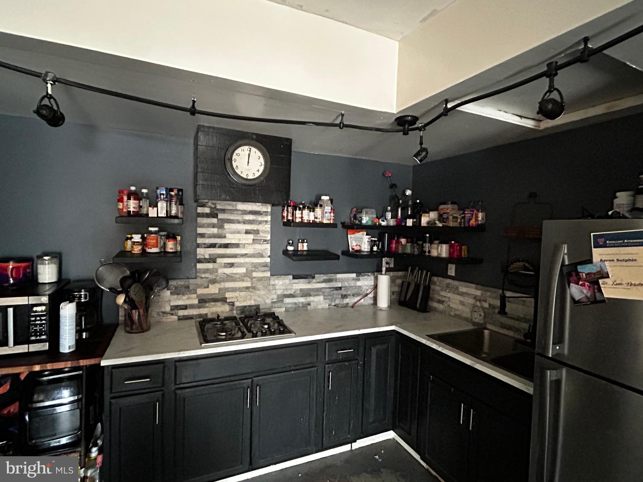436 Hinsons Ford Road Amissville, VA 20106 - Photo 54 of 54 a kitchen with a sink and cabinets