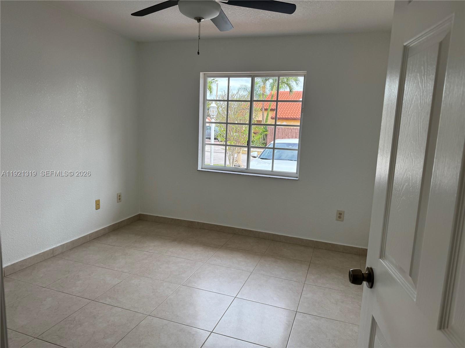 5332 Southwest 142nd Place Miami, FL 33175 - Photo 23 of 30 a view of an empty room with a window