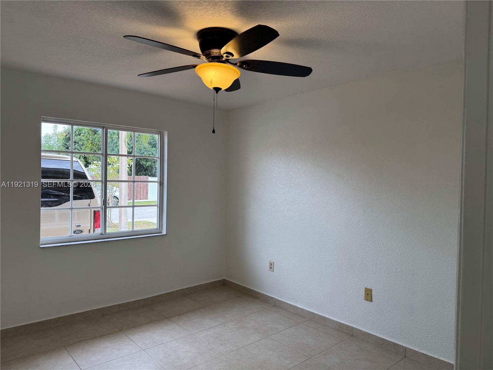 5332 Southwest 142nd Place Miami, FL 33175 - Photo 24 of 30 an empty room with window