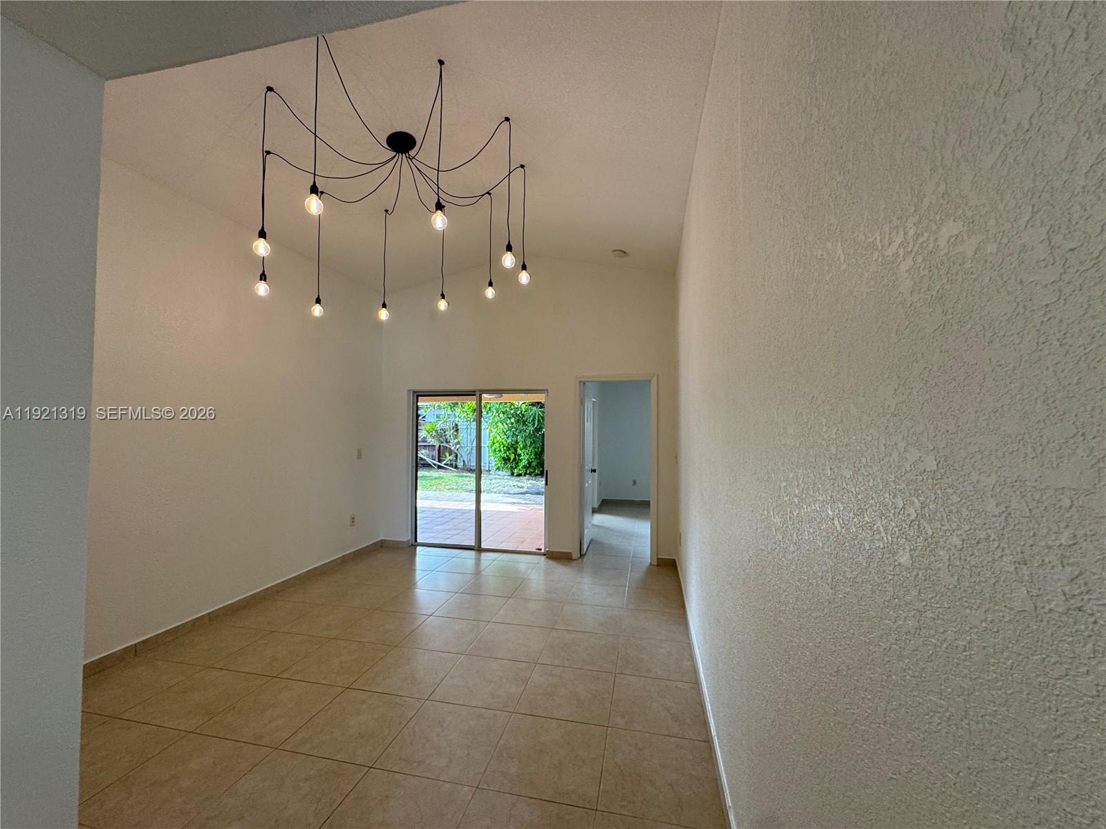 5332 Southwest 142nd Place Miami, FL 33175 - Photo 7 of 30 a view of an entryway and a kitchen