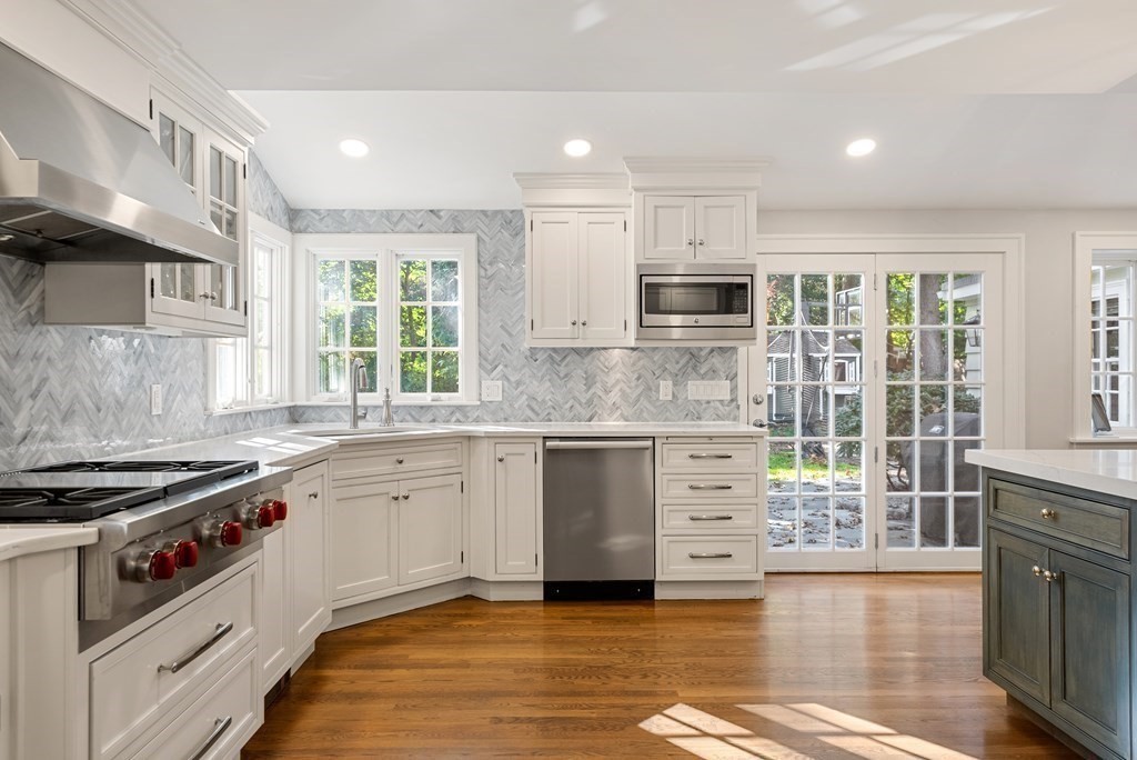 33 Damien Road Wellesley, MA 02481 - Photo 15 of 41 a kitchen with stainless steel appliances granite countertop a stove and a sink