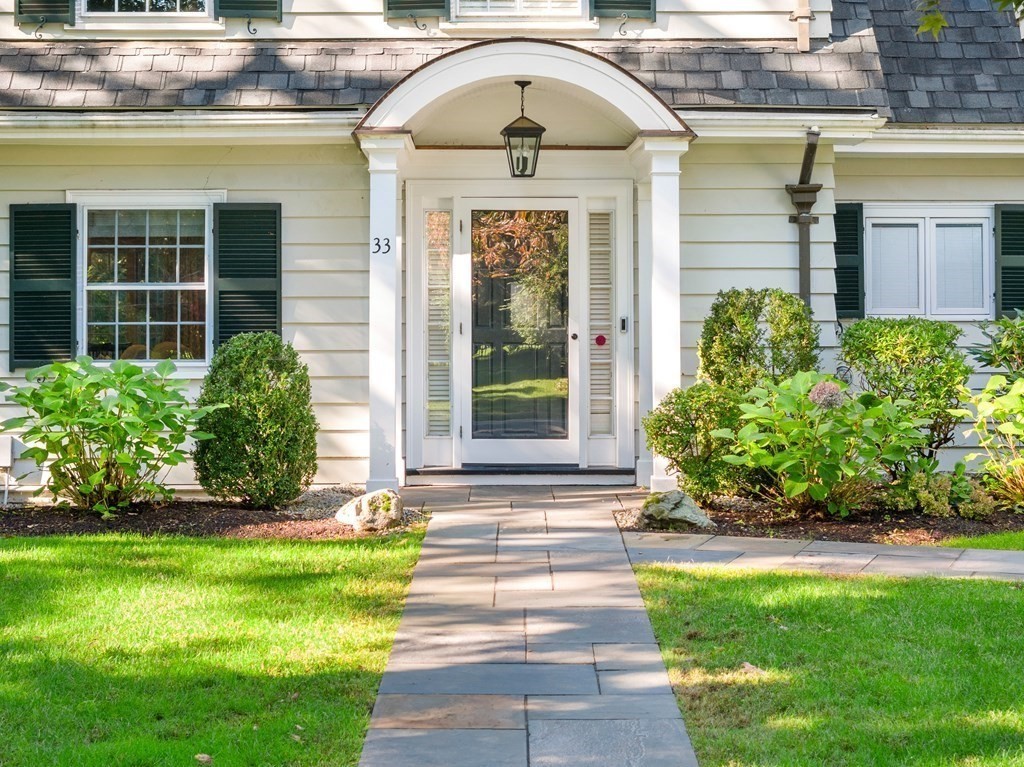 33 Damien Road Wellesley, MA 02481 - Photo 2 of 41 a front view of a house with garden