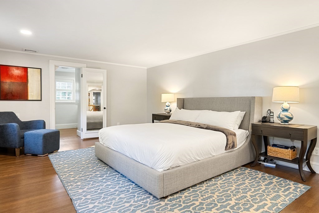 33 Damien Road Wellesley, MA 02481 - Photo 24 of 41 a bedroom with a large bed and a couch