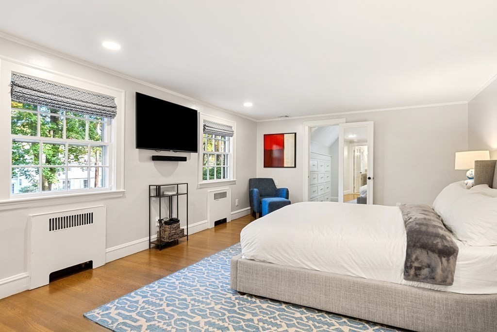 33 Damien Road Wellesley, MA 02481 - Photo 25 of 41 a bedroom with a bed and a flat screen tv