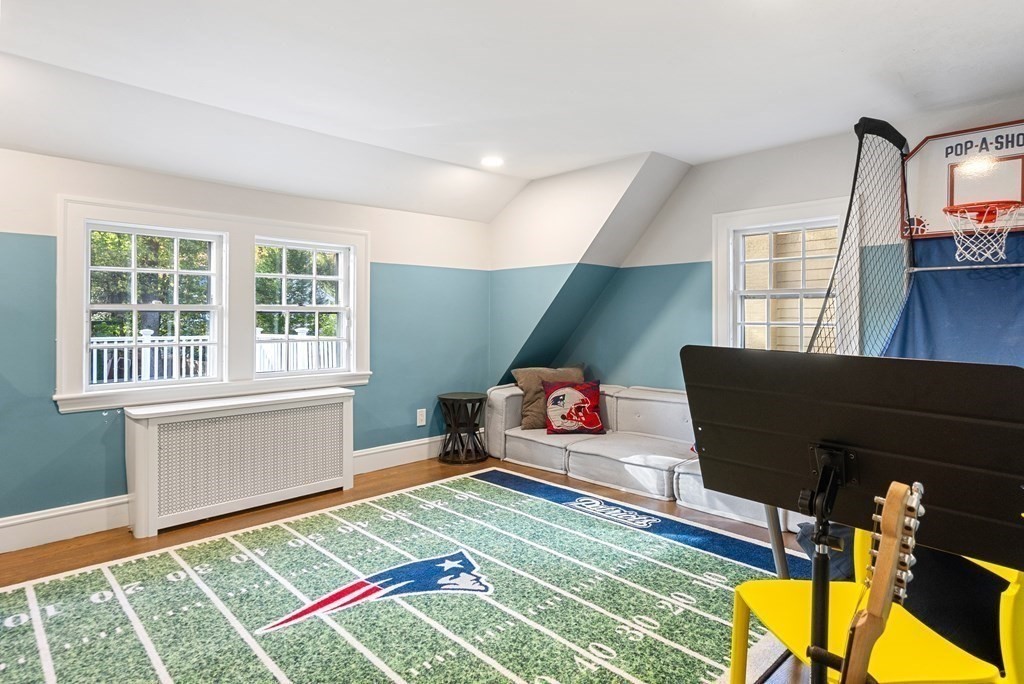33 Damien Road Wellesley, MA 02481 - Photo 30 of 41 a living room with a rug and a table