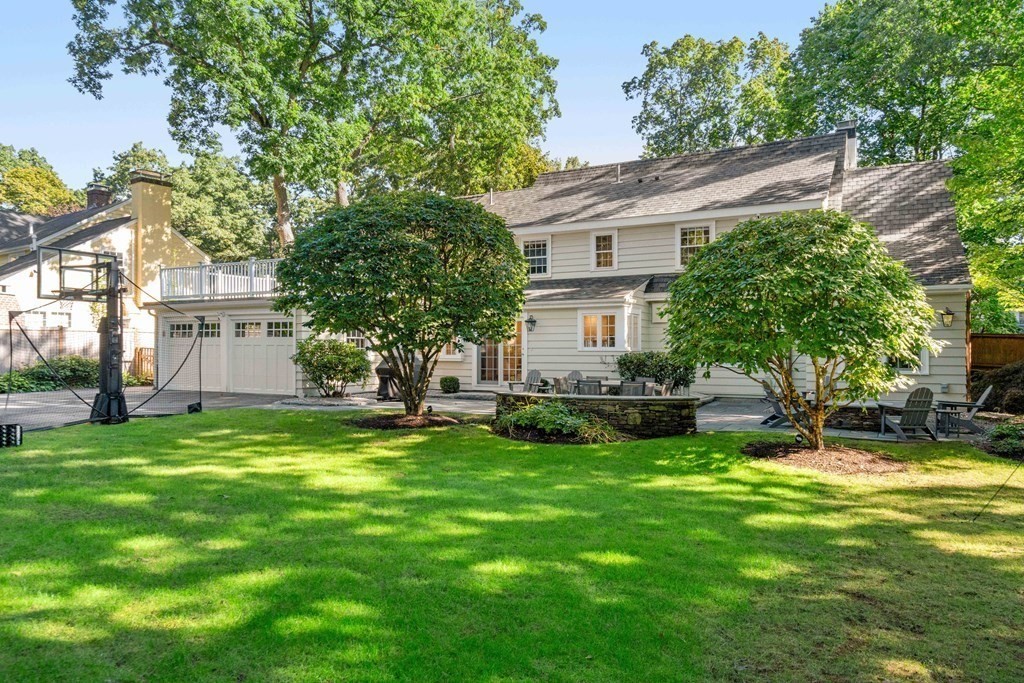 33 Damien Road Wellesley, MA 02481 - Photo 34 of 41 a view of a house with a backyard