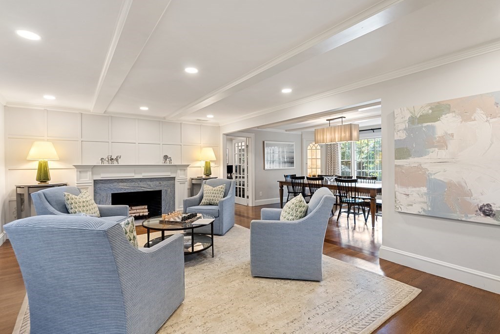 33 Damien Road Wellesley, MA 02481 - Photo 8 of 41 a living room with furniture a fireplace and a table