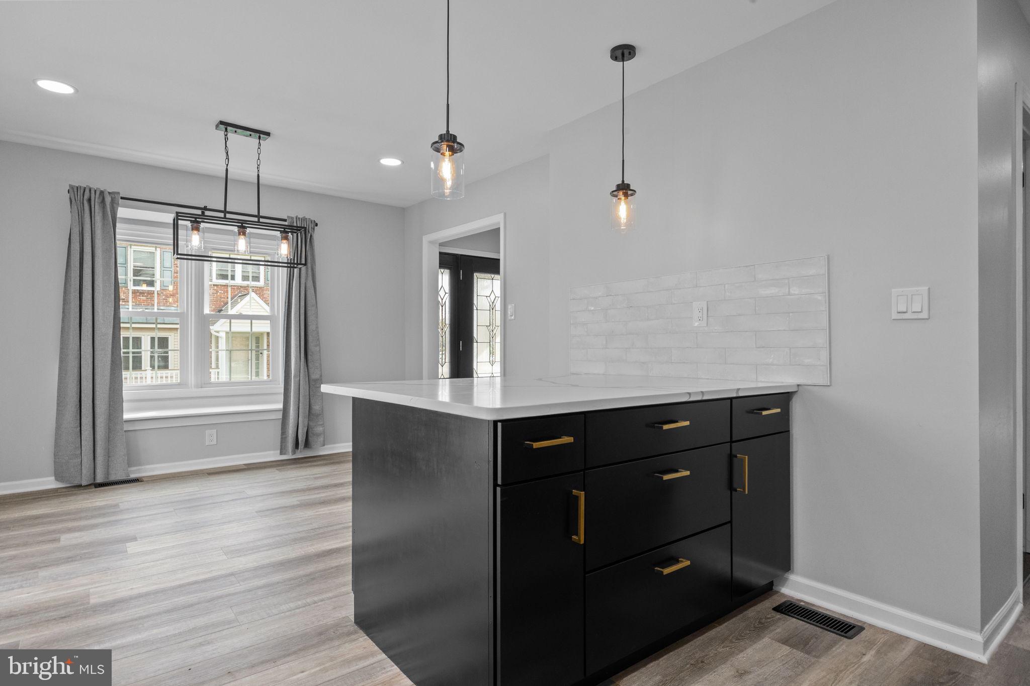 548 Susan Drive King of Prussia, PA 19406 - Photo 11 of 27 a view of a kitchen counter space with wooden floor