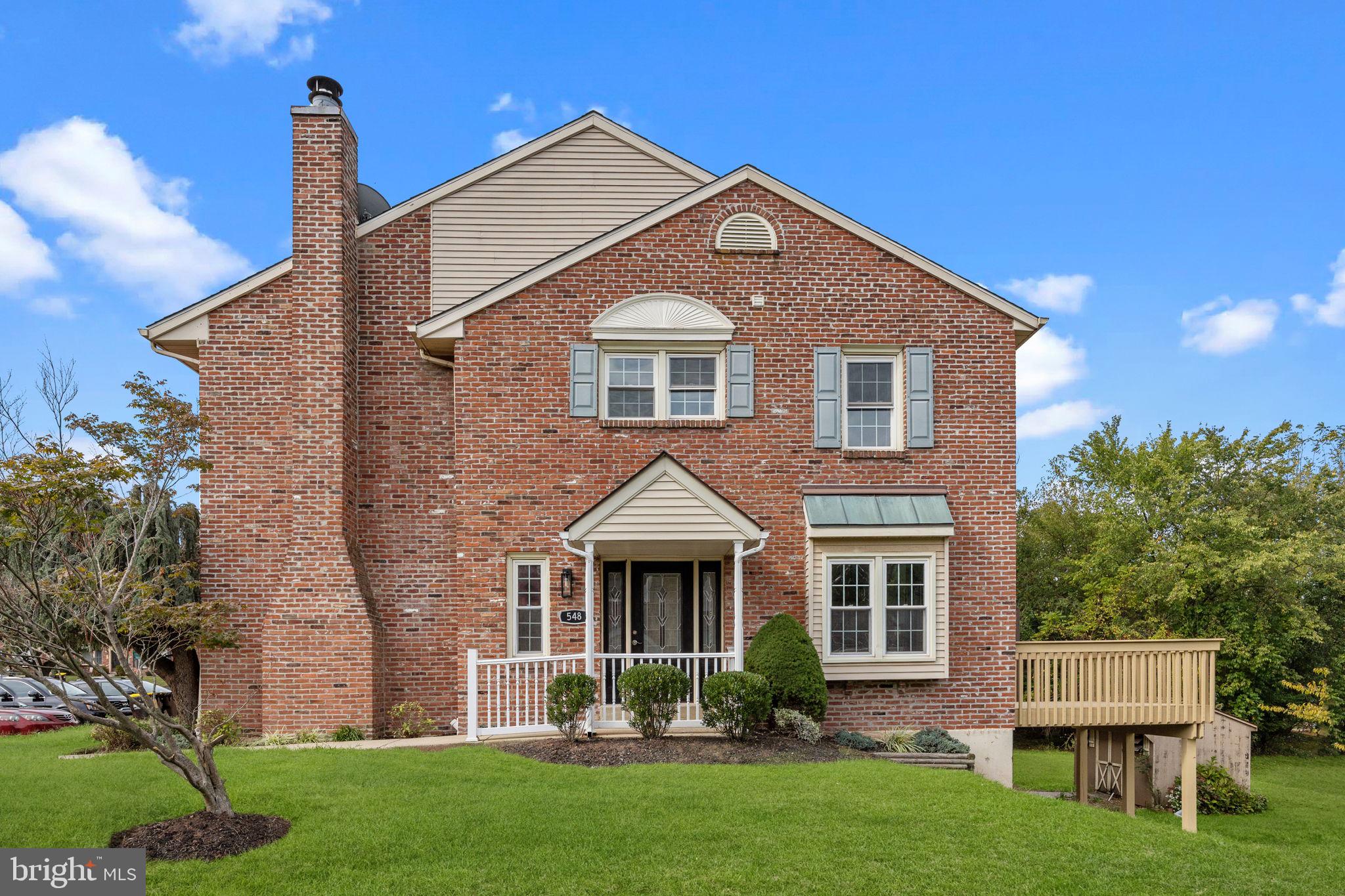 548 Susan Drive King of Prussia, PA 19406 - Photo 12 of 27 a front view of a house with a yard and garage