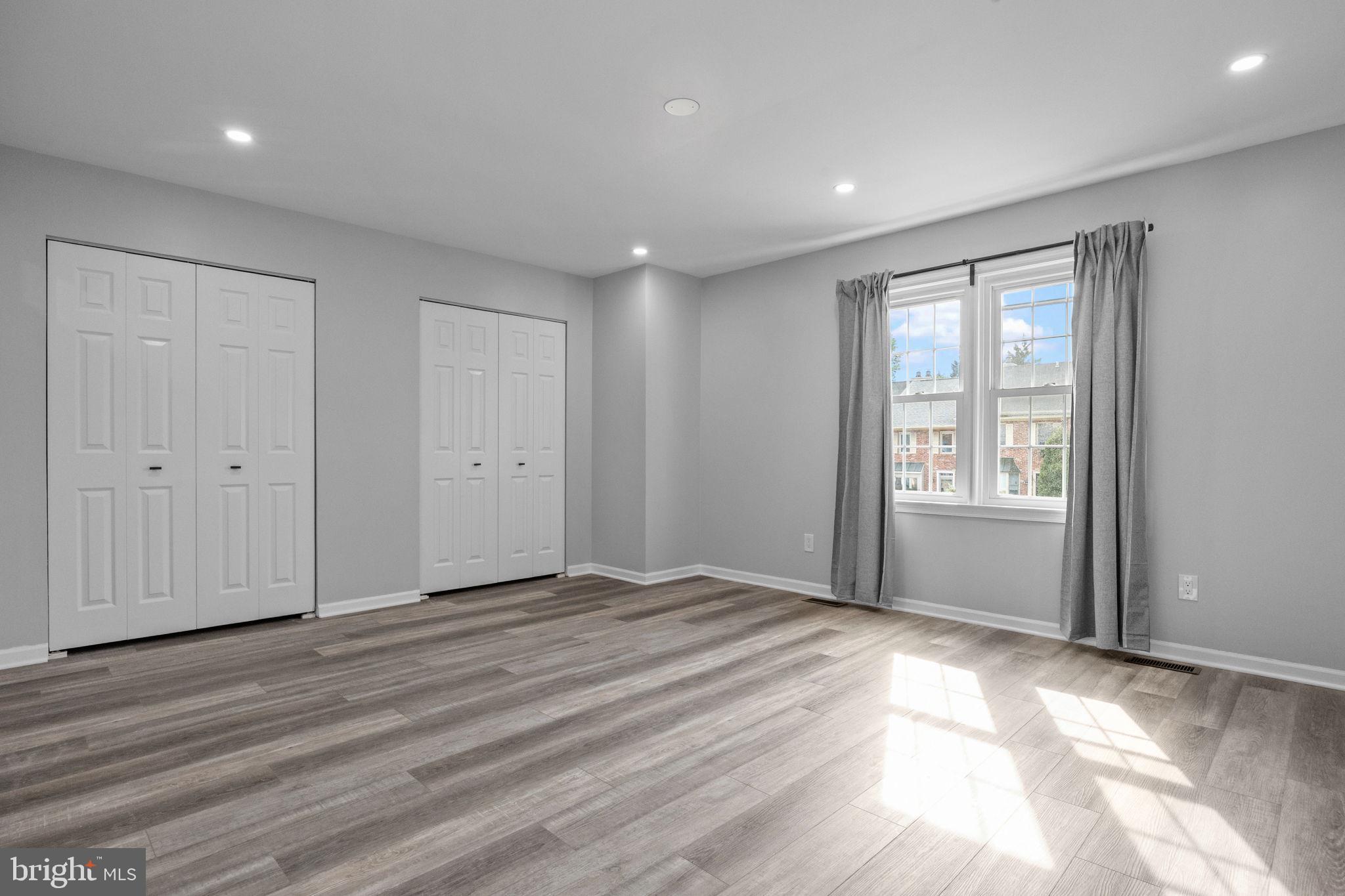 548 Susan Drive King of Prussia, PA 19406 - Photo 14 of 27 a view of an empty room with wooden floor and a window