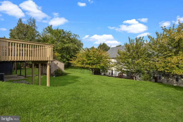 a view of a backyard with a garden