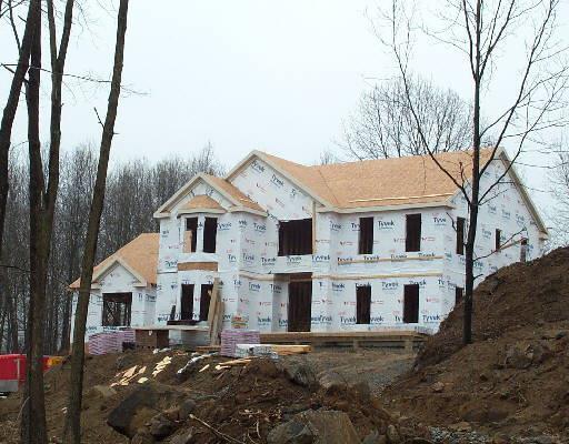 43 Cider Mill Road Newtown, CT 06482 - Photo 1 of 1 a view of a white house with a large tree next to a yard